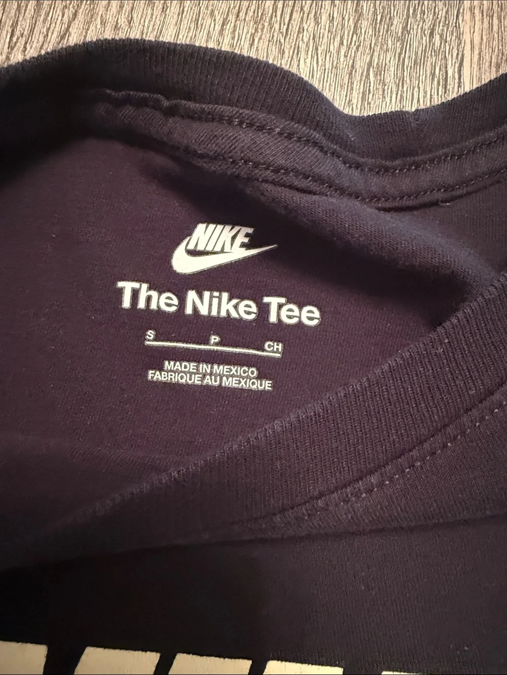 Nike Black Tee with Cream Swoosh Logo